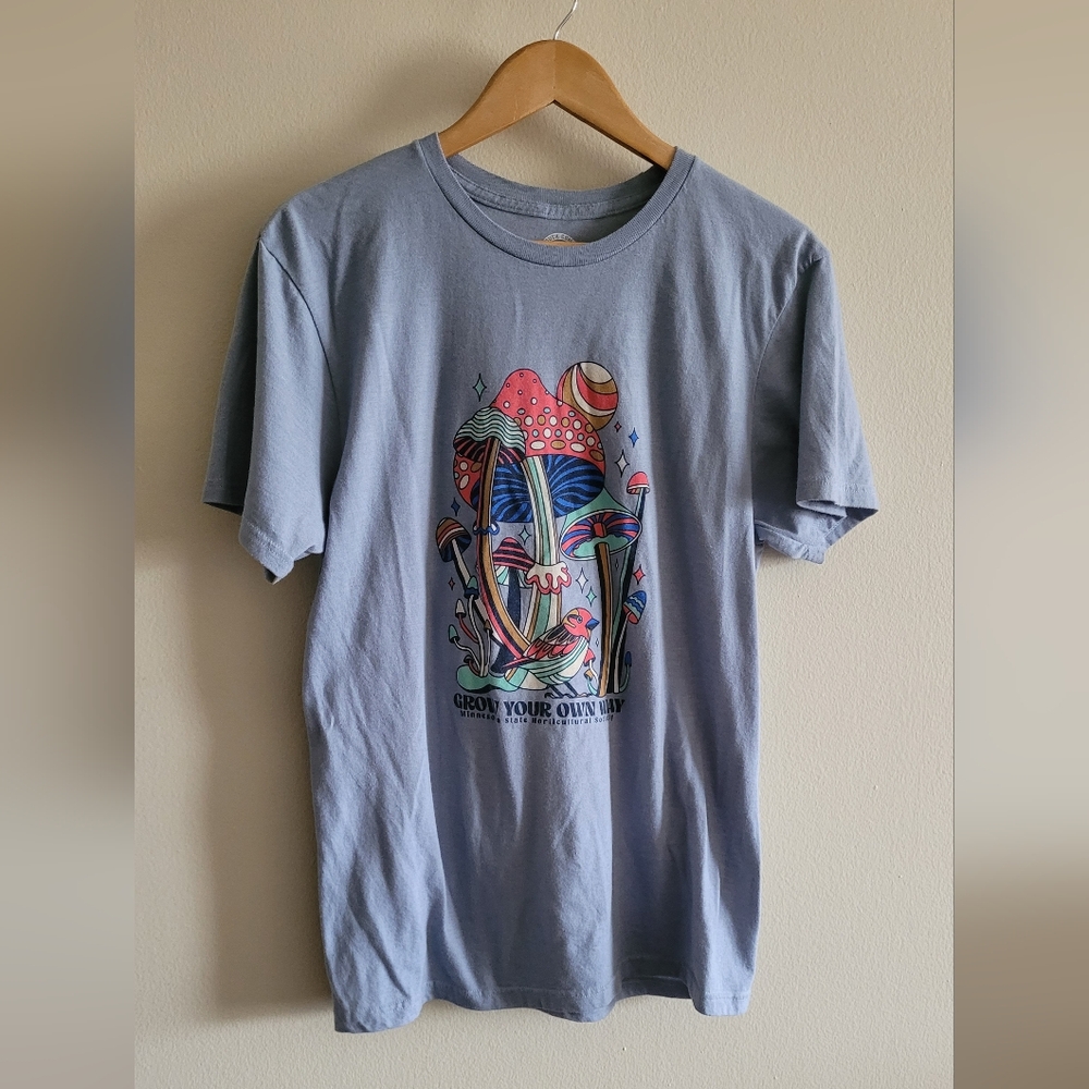 The Duck Company "Grow Your Own Way" Graphic T, Size Adult Medium, Light Blue.